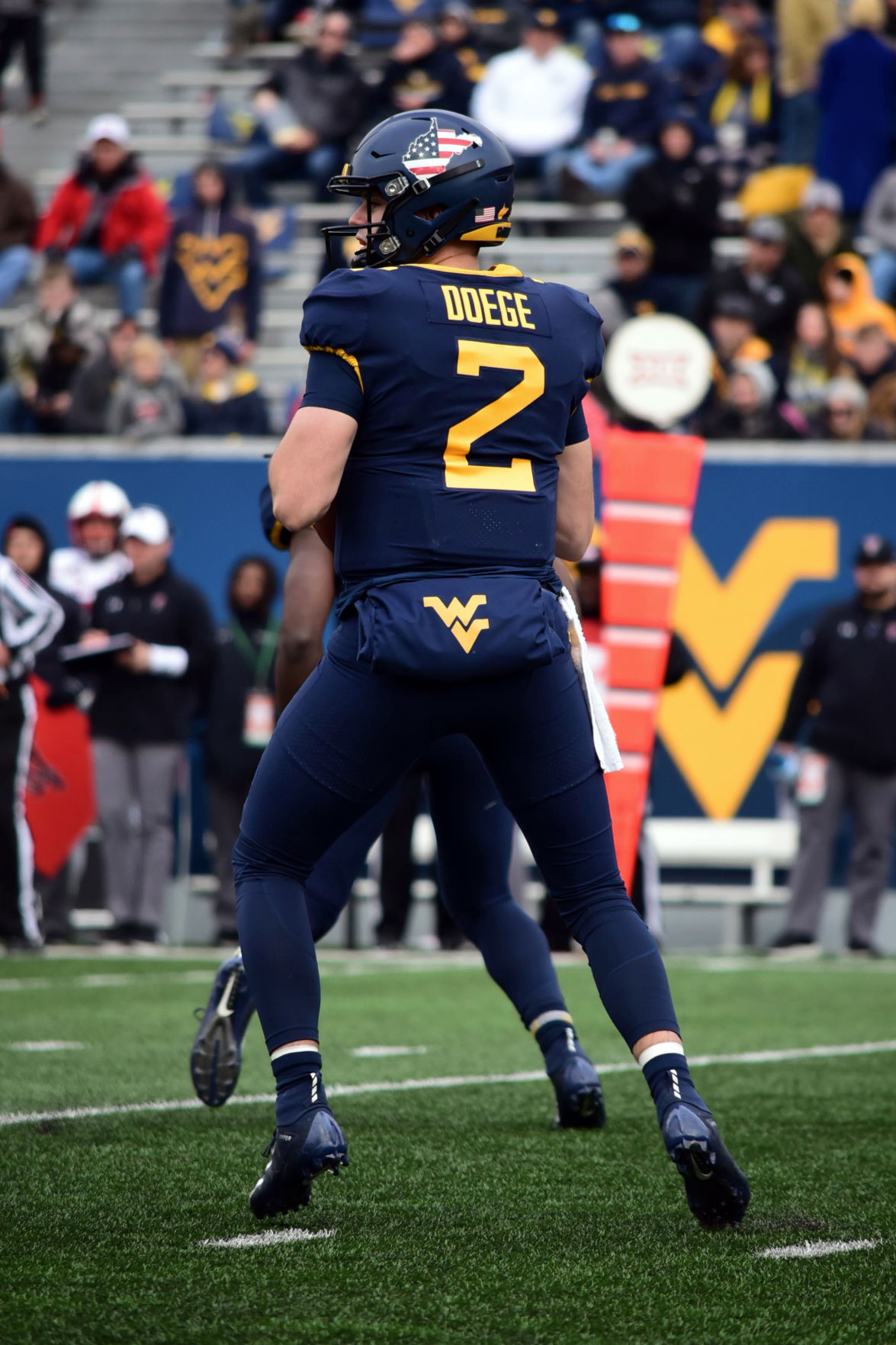 Junior Quarterback Jarret Doege looks downfield for an open receiver.
